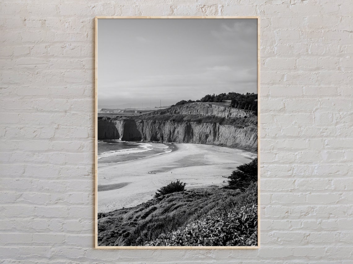 Dramatic Cliffs Above A Wide Sandy Beach Black And White Photo Poster