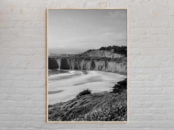 Dramatic Cliffs Above A Wide Sandy Beach Black And White Photo Poster