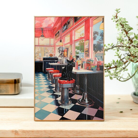 Black Cat Sitting on a Stool in a Retro 1950s Diner Painting Poster