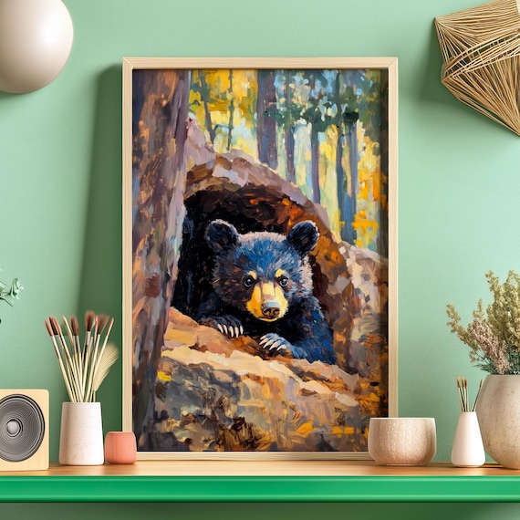 Black Bear Cub Peeking Out of a Hollow Log in an Autumn Forest Poster