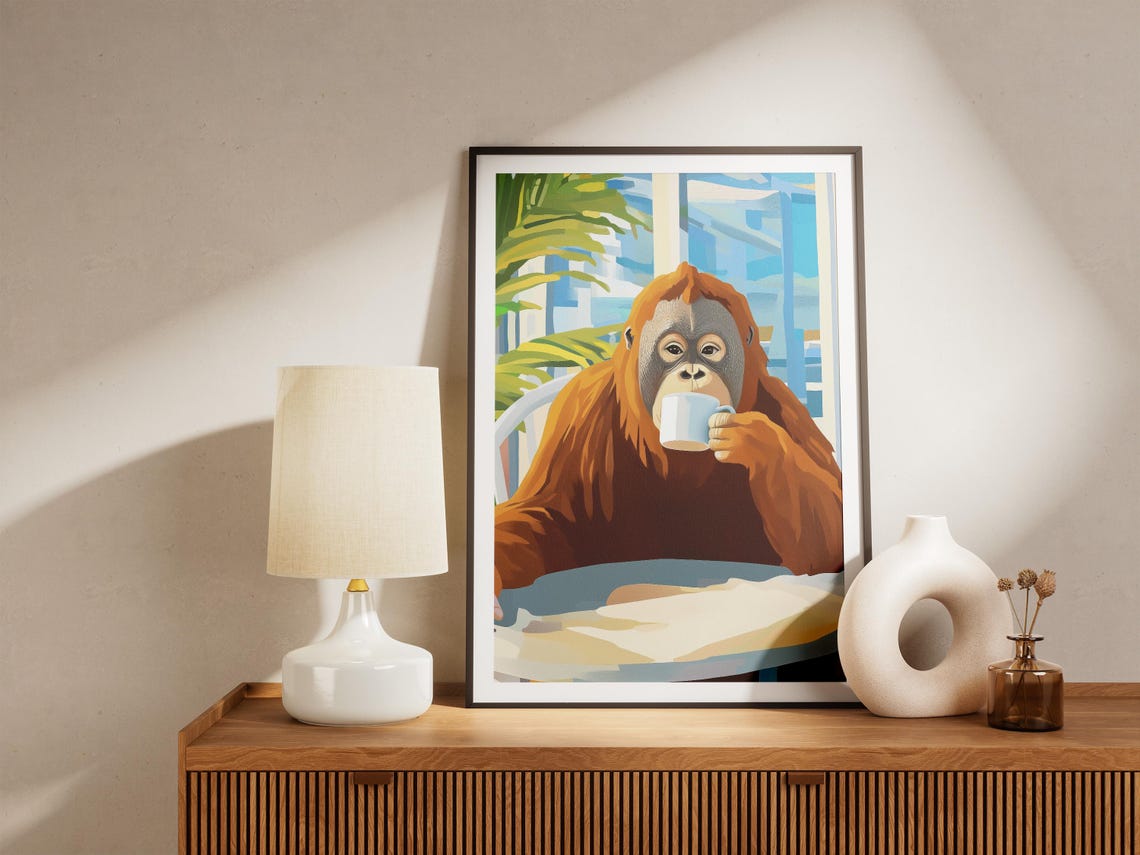 Calm Orangutan Sipping Coffee at a Tropical Cafe Table Poster - Image 4