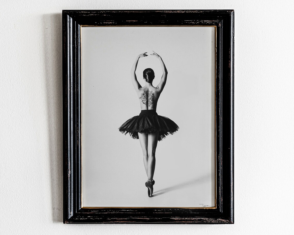 Black and White Photo of a Ballerina With a Back Tattoo En Pointe Poster