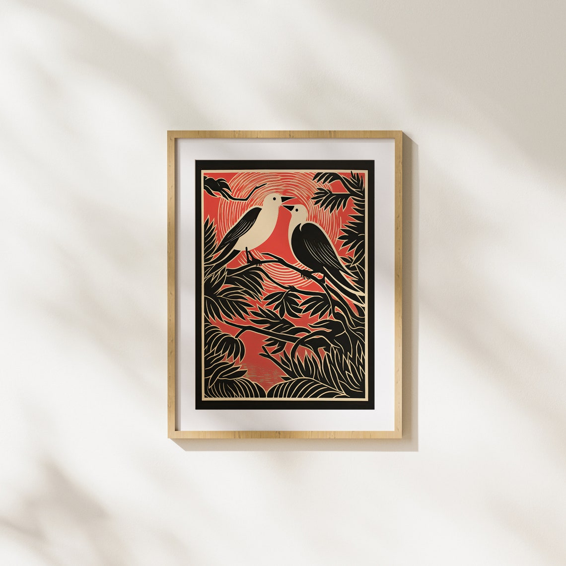 Two Woodcut Birds Facing Each Other Against Glowing Red Sun Poster