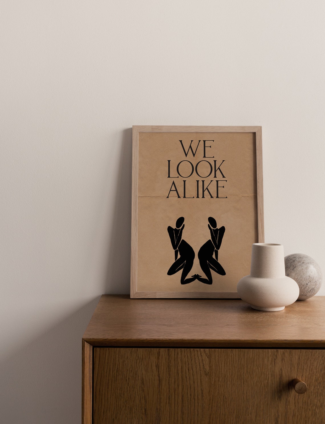 We Look Alike Mirrored Black Silhouette Women on Kraft Paper Poster - Image 3