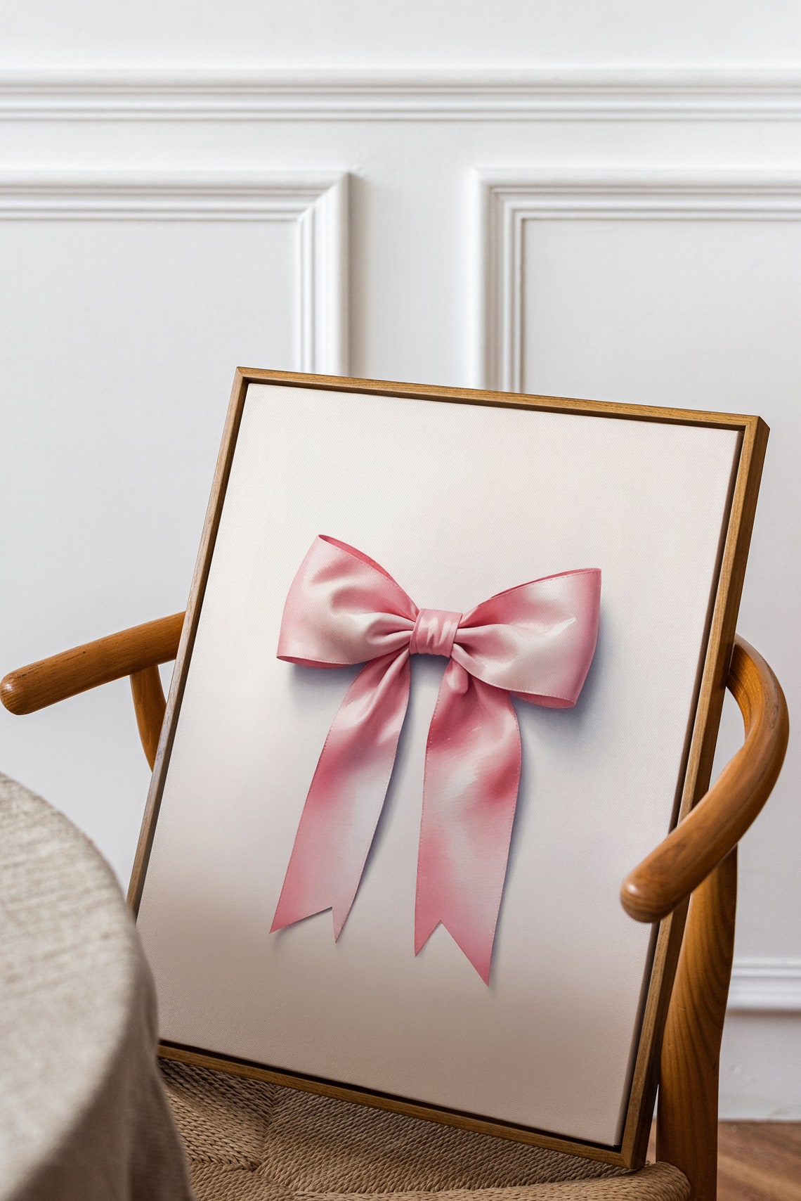 Glossy Pink Satin Ribbon Bow Framed Print In A Modern Living Room - Image 2