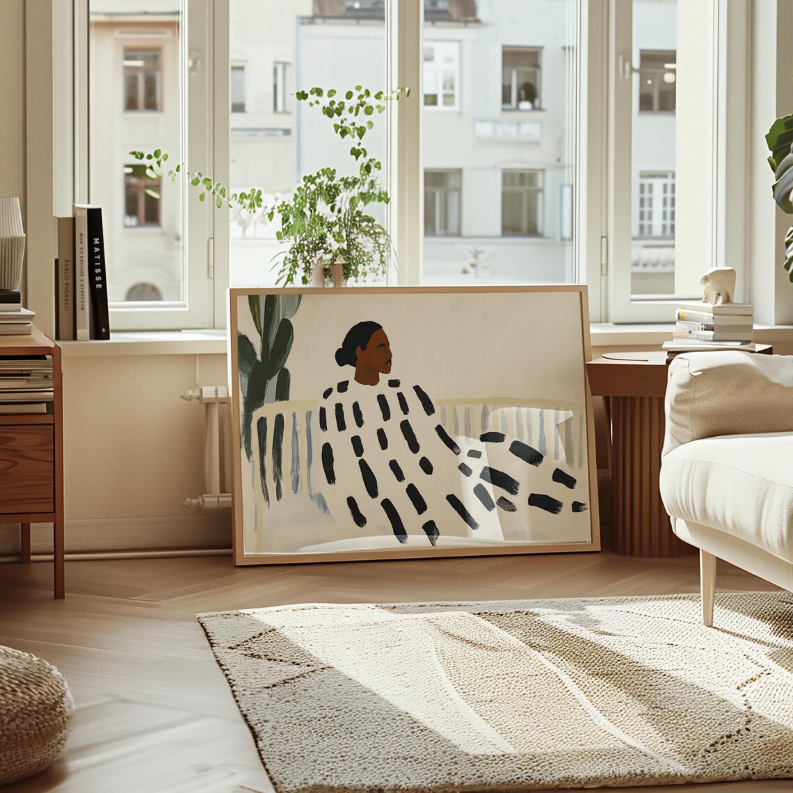 Woman in Bold Black Brushstroke Dress Beside Tall Cactus Poster - Image 4