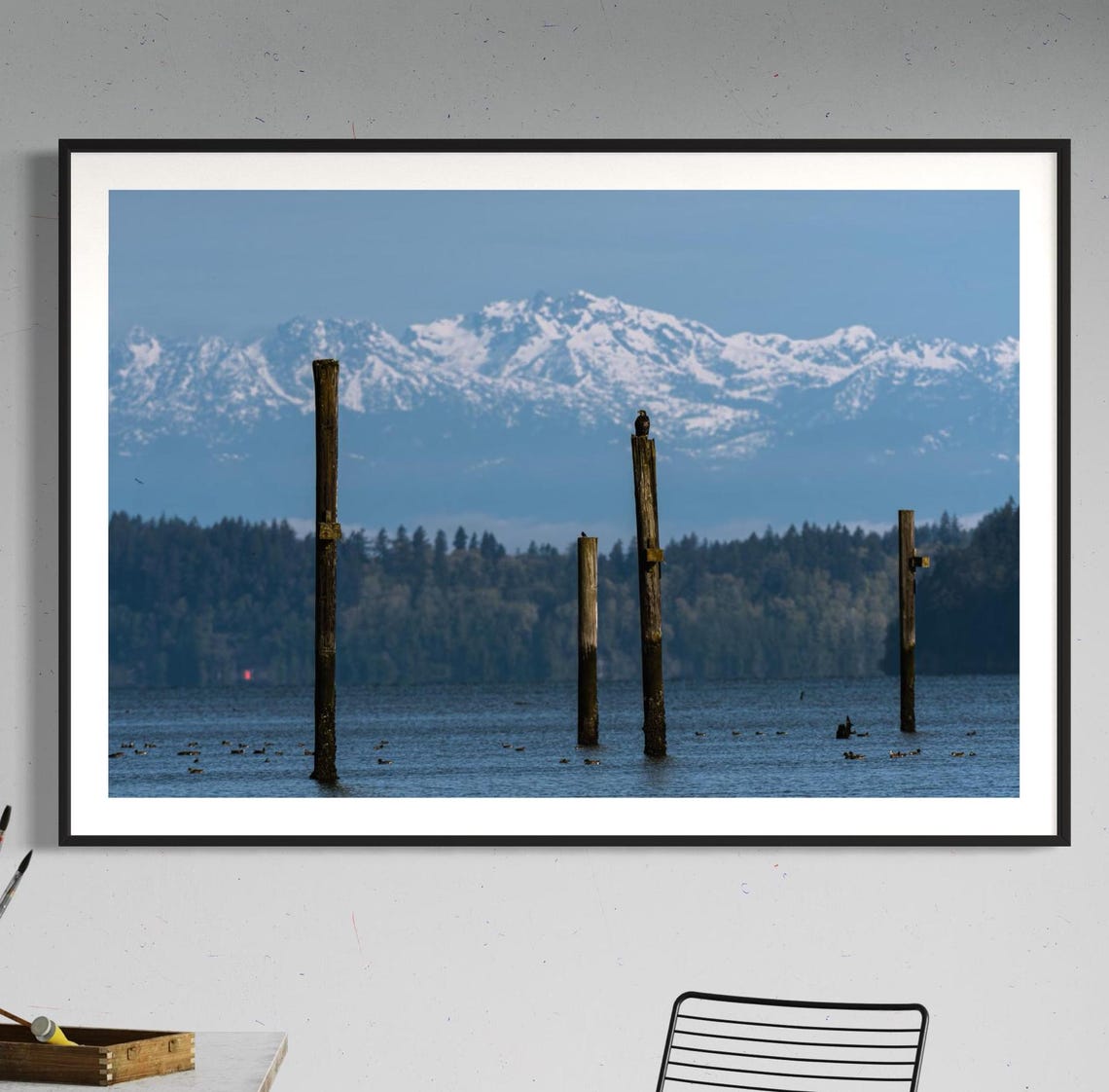 Snow Capped Mountains Across the Water with Old Pier Pilings Poster