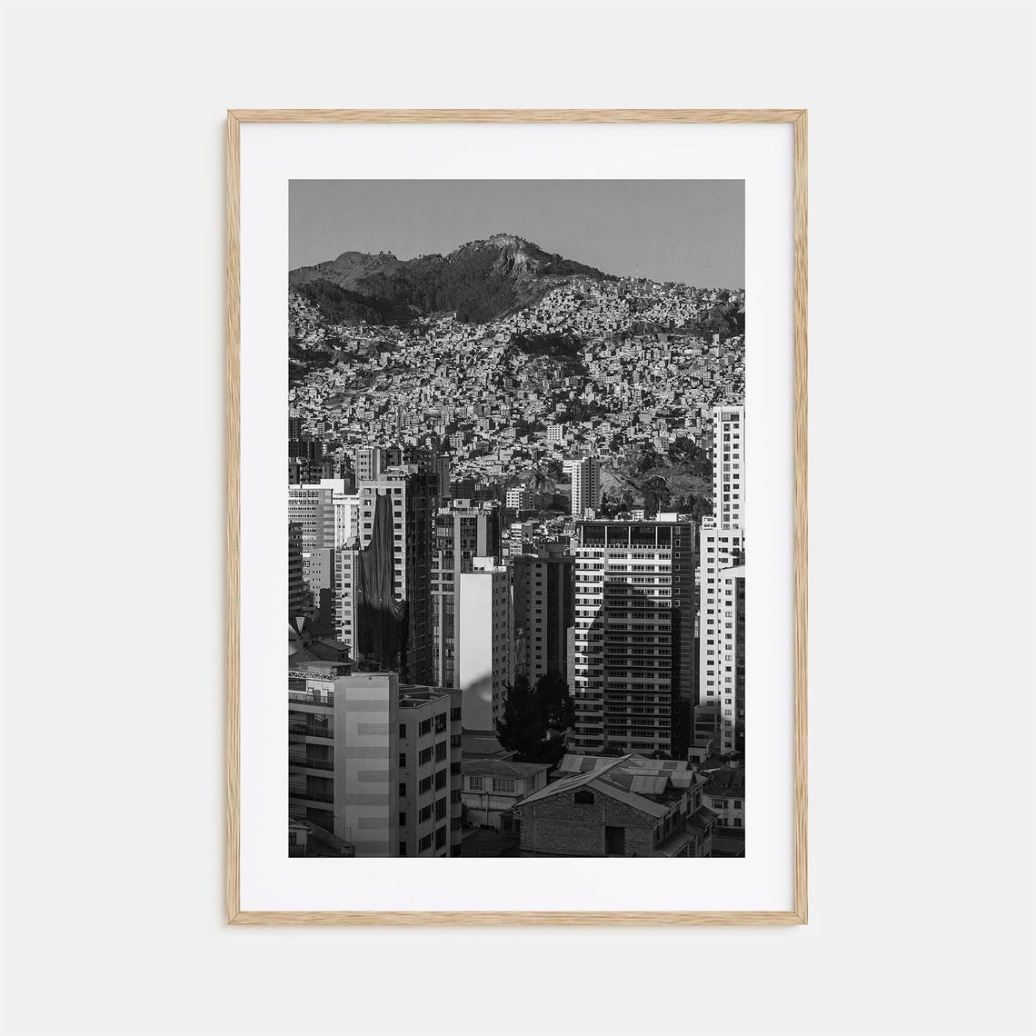Dense City Beneath Hillside Homes Black And White Cityscape Poster