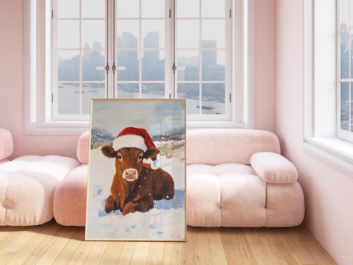 Baby Brown Cow Wearing Santa Hat in a Snowy Field Winter Poster - Image 3