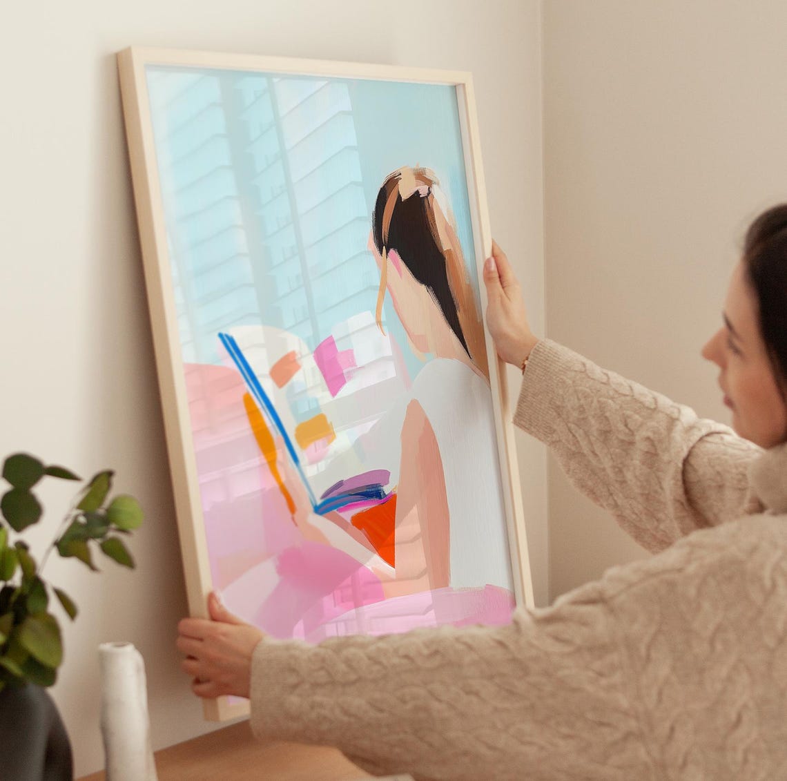 Woman Reading Magazine Pink Sofa Pastel Back View Art Poster - Image 3