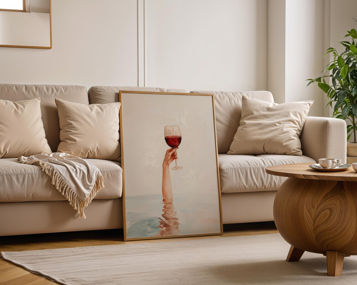 Hand Holding Red Wine Glass Rising from Calm Water Art Poster - Image 5