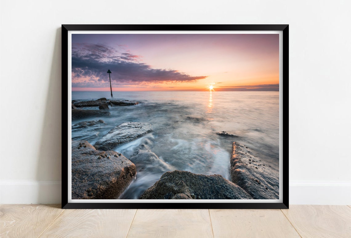 Tywyn Beach Sunset Over Rocky Shore And Calm Sea Wales Poster