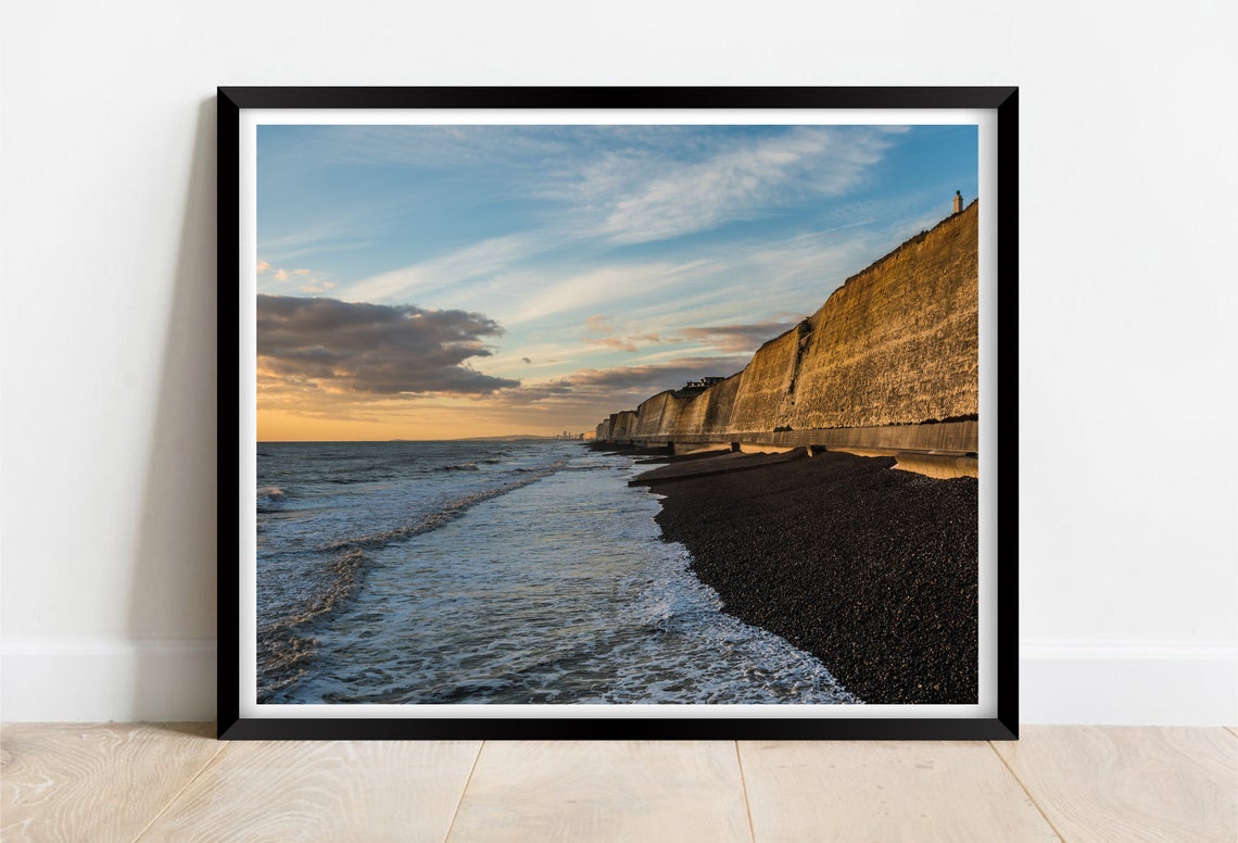Peacehaven Beach Chalk Cliffs and Shingle Shore at Sunset Poster