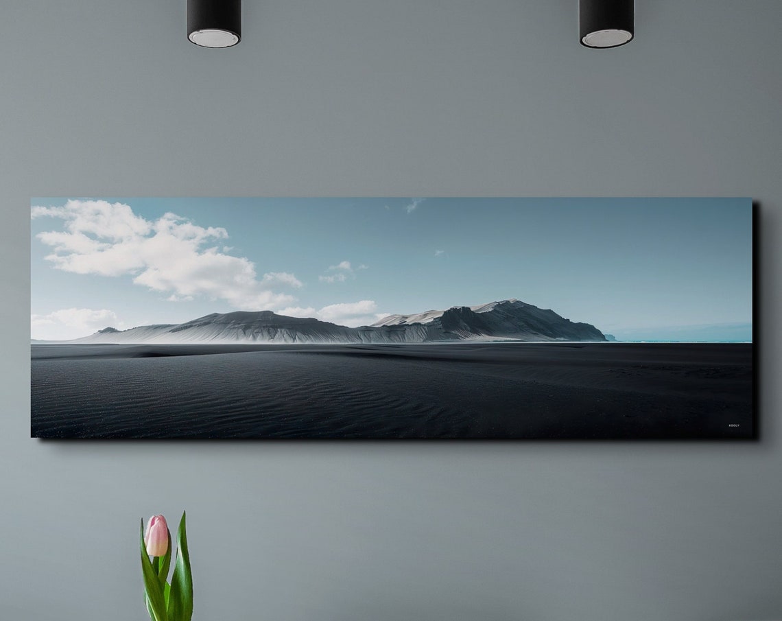 Minimal Black Sand Beach Stretching Toward Distant Mountains Poster