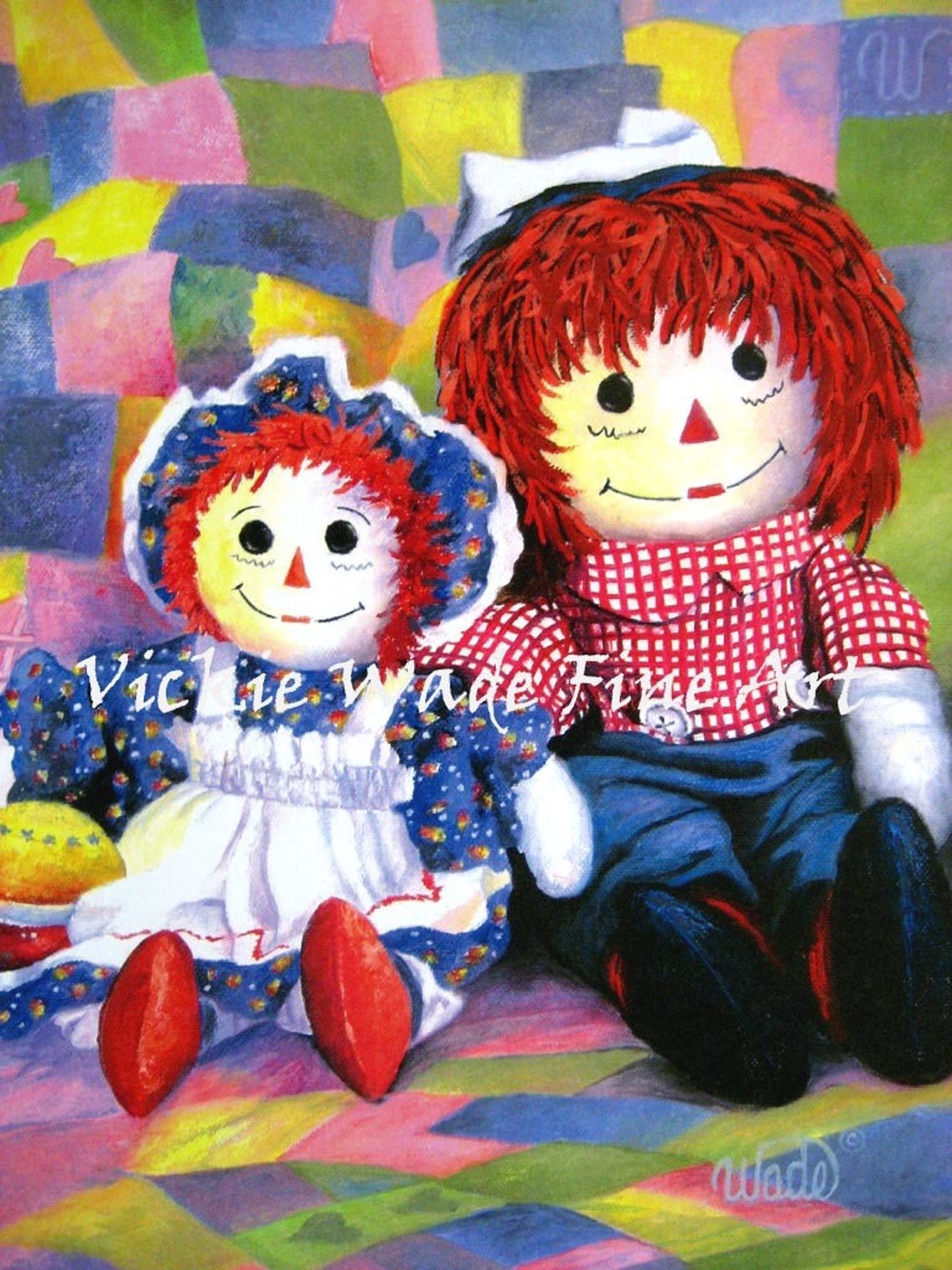 Raggedy Ann and Andy Rag Dolls Sitting on a Patchwork Quilt Poster