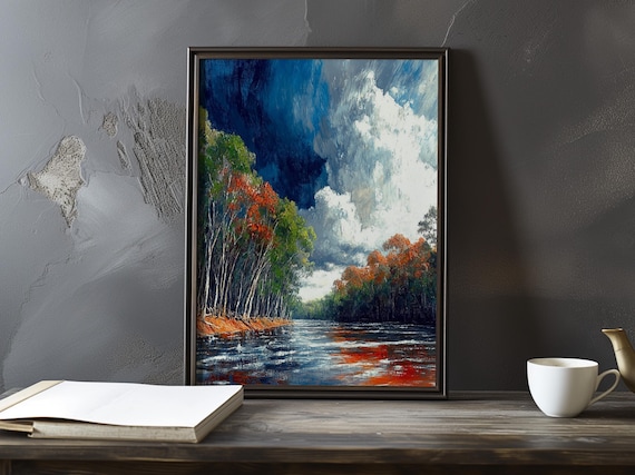 Fiery Autumn Foliage Along a River Under Deep Blue Sky Poster