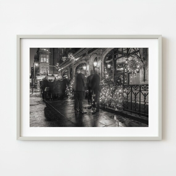 Black And White Christmas Pub Patrons On Rainy Street Photo Poster