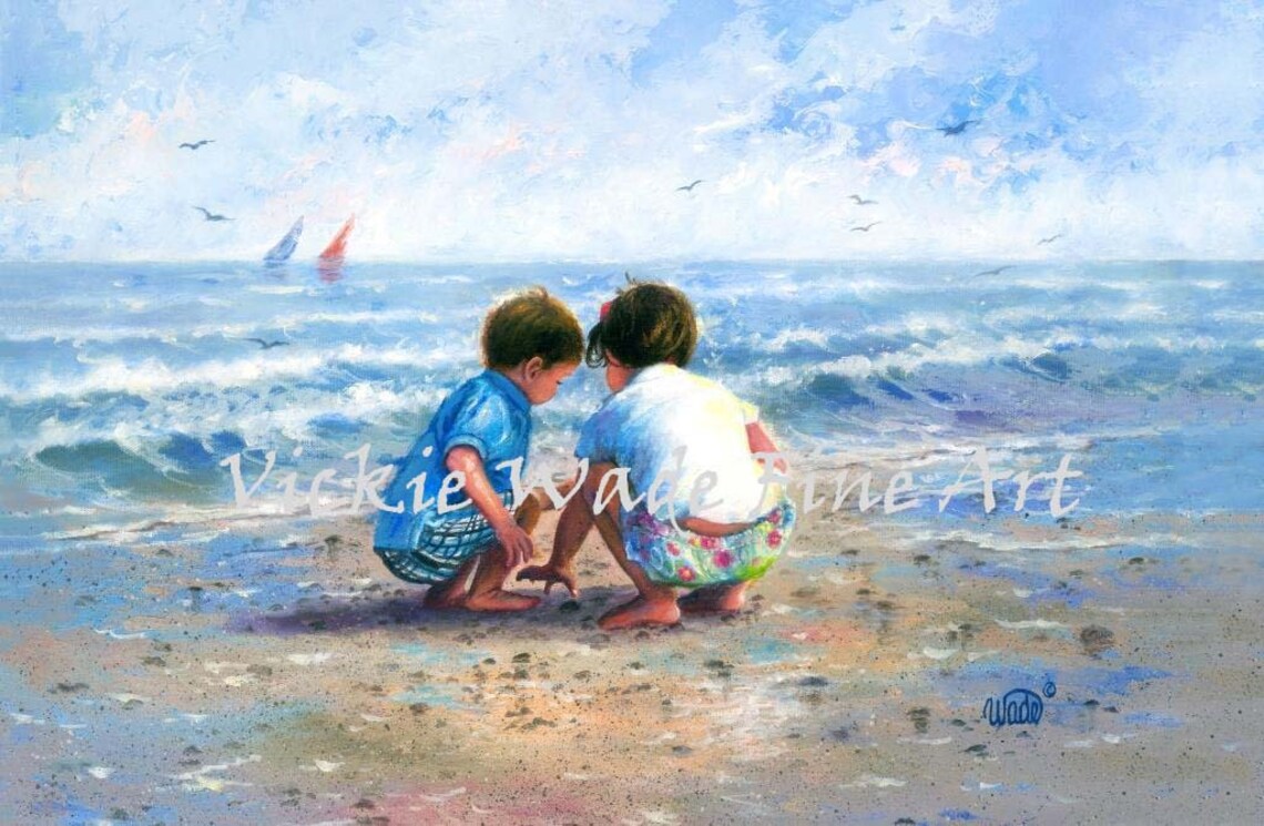 Little Boy And Girl Playing In The Sand Beside The Ocean Poster