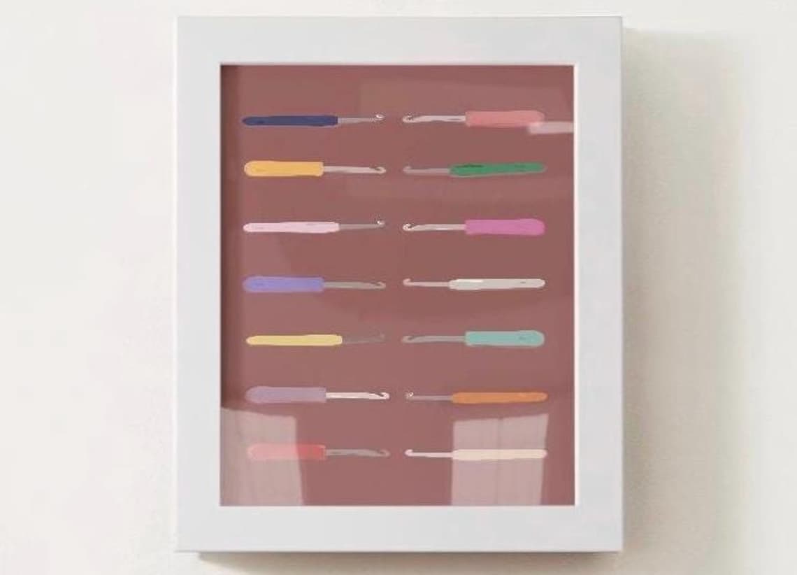 Colorful Crochet Hooks Collection On Mauve Background Craft Poster