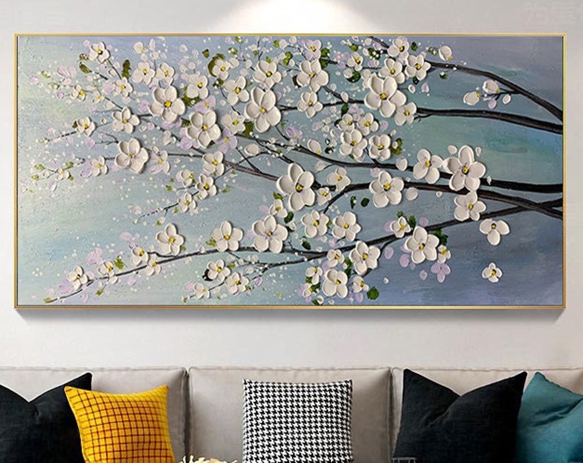 White Spring Blossoms Opening on Dark Branches Over Teal Poster