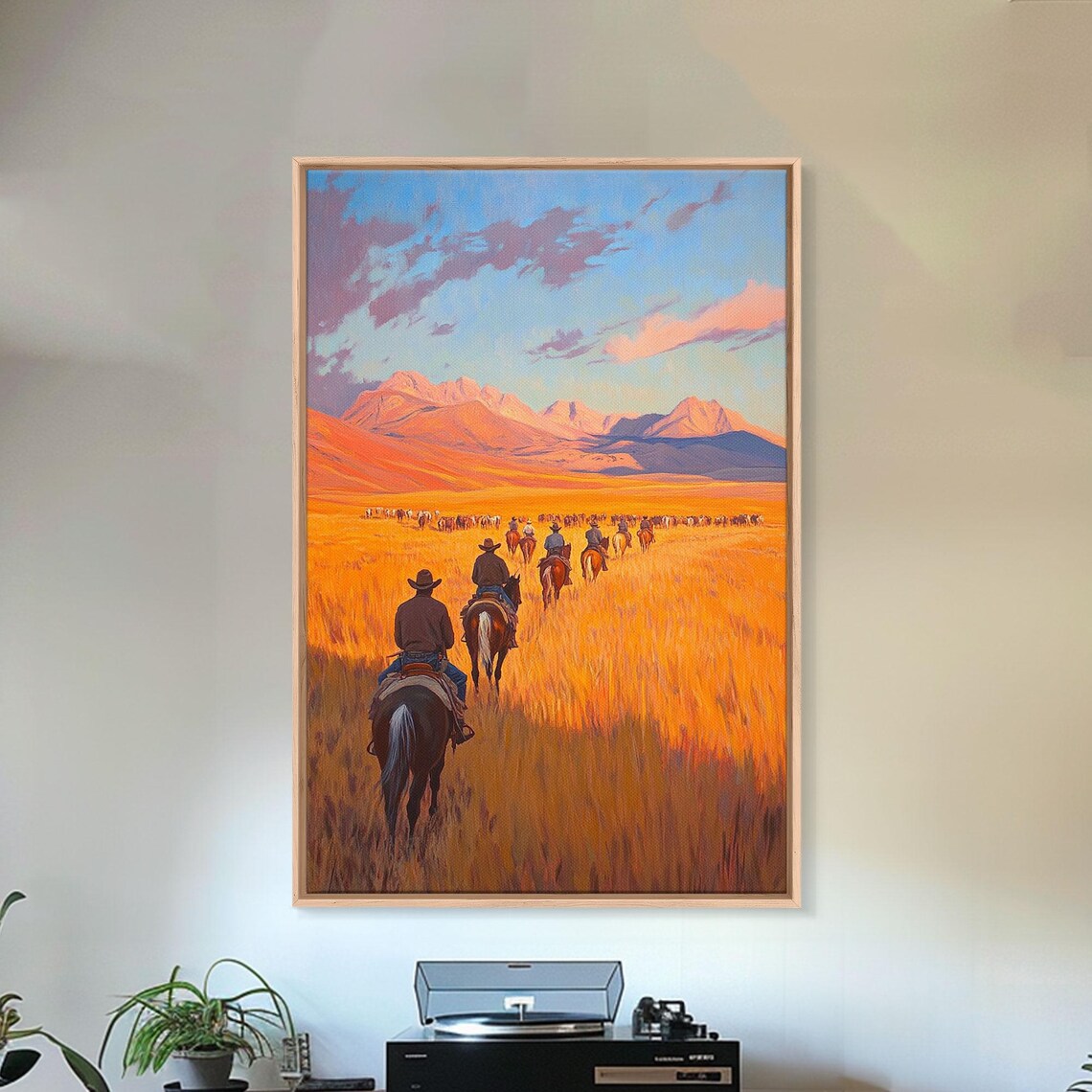Cowboys Riding Golden Grassland Toward Mountains Sunset Poster