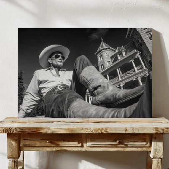 Cowboy In Front Of Western Mansion