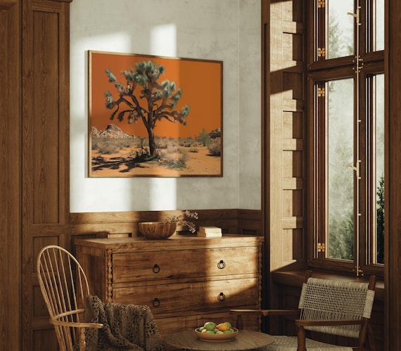 Joshua Tree In Desert With Bold Orange Sky