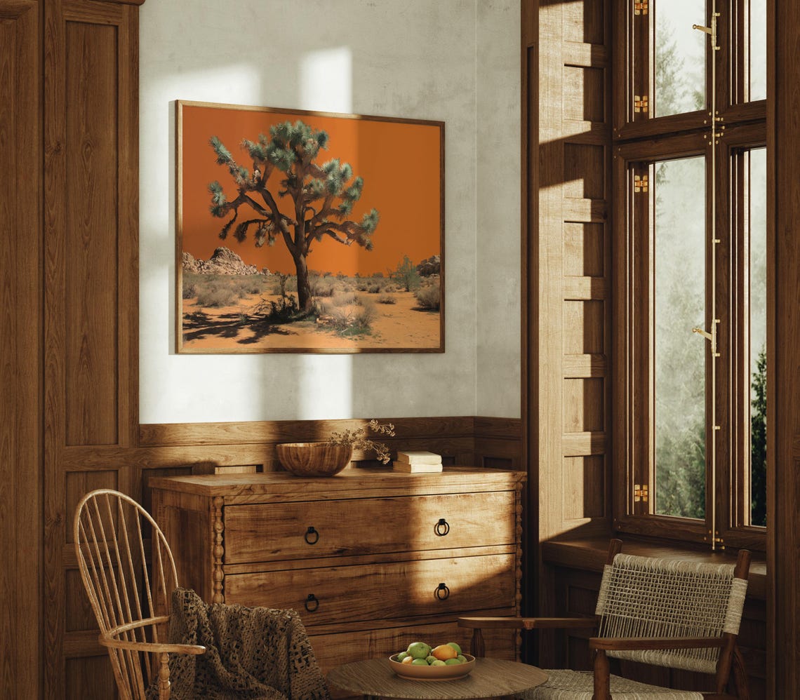 Lone Joshua Tree In Desert Under Bold Orange Sunset Sky Poster