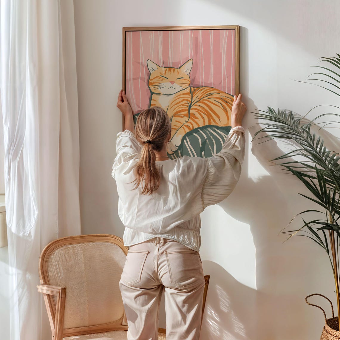 Sleepy Orange Tabby Cat Napping on a Cozy Striped Bed Poster - Image 5