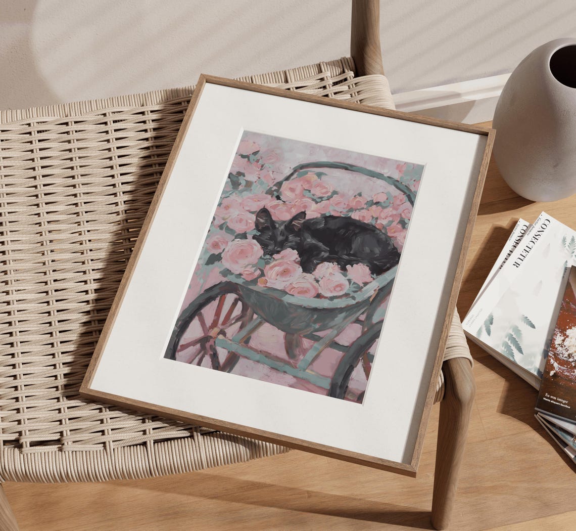 Black Cat Sleeping In Wheelbarrow Of Pink Roses Garden Poster