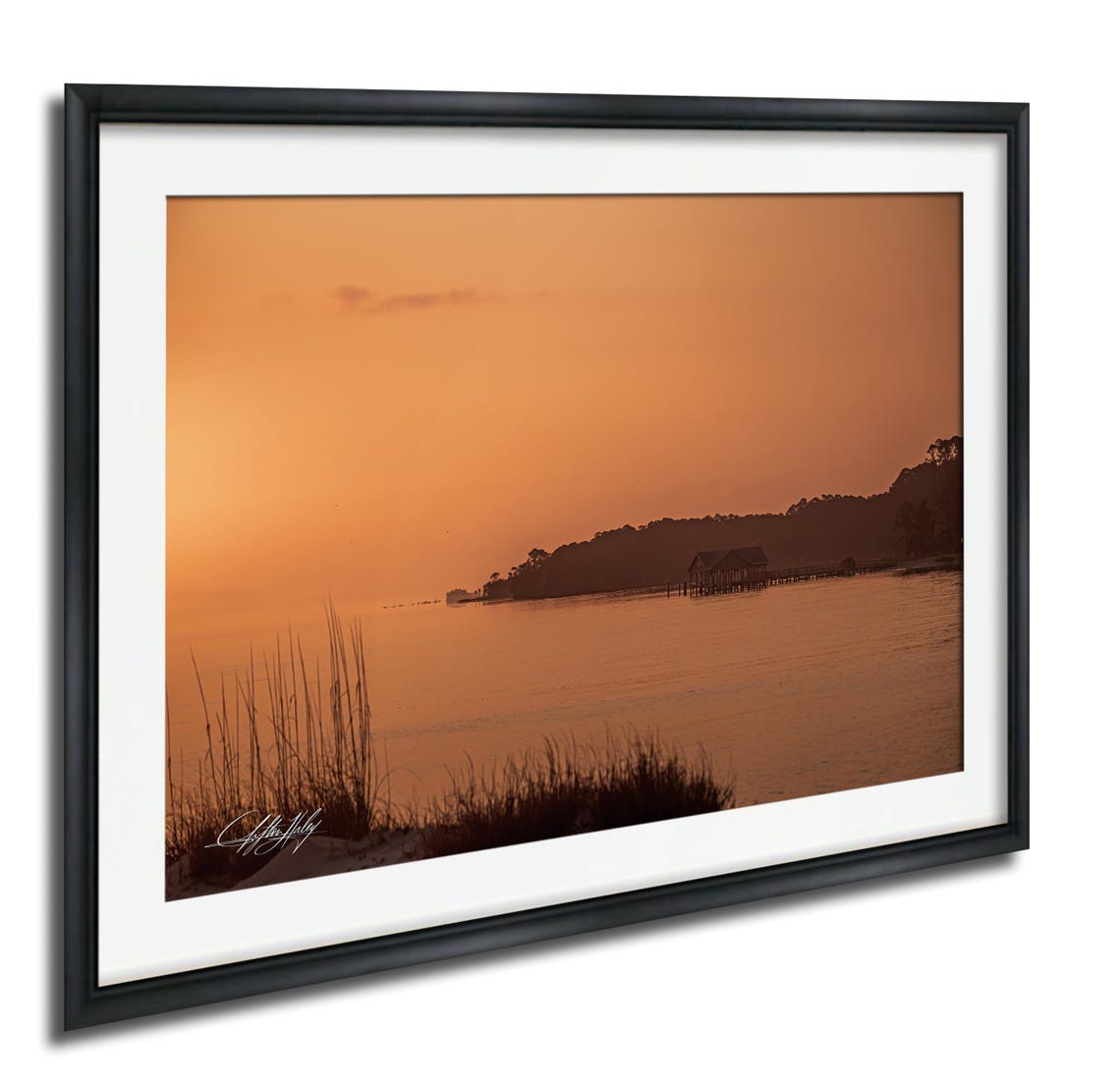 Orange Sunrise Over Calm Water with a Boathouse Photo Poster