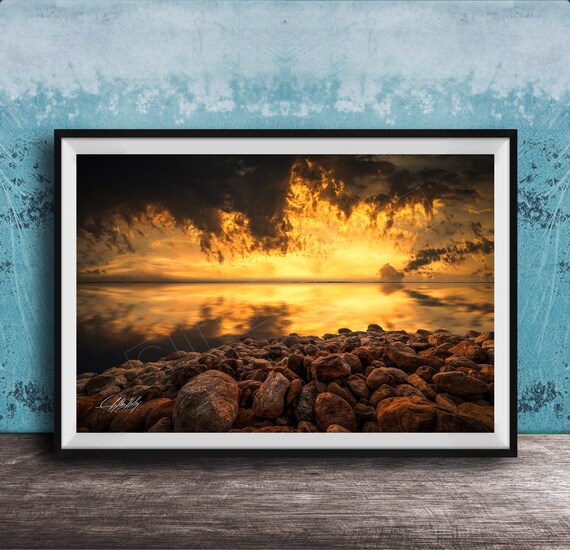 Sunrise Over Calm Waters Golden Clouds Rocky Shore Landscape Photo Poster