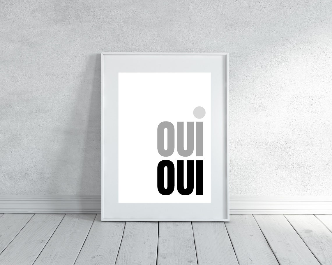 Oui Oui Typography Poster In Light Grey And Black On A White Wall - Image 2