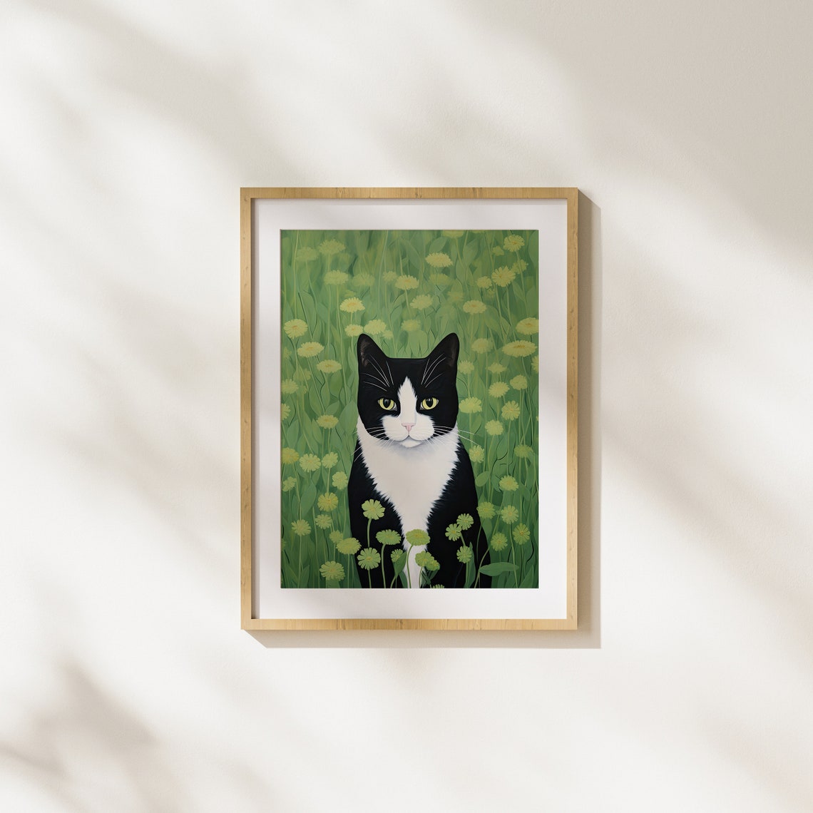 Black and White Tuxedo Cat Among Green Meadow Flowers Poster