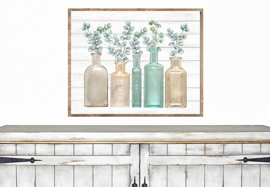 Vintage Apothecary Glass Bottles Holding Eucalyptus Sprigs Poster