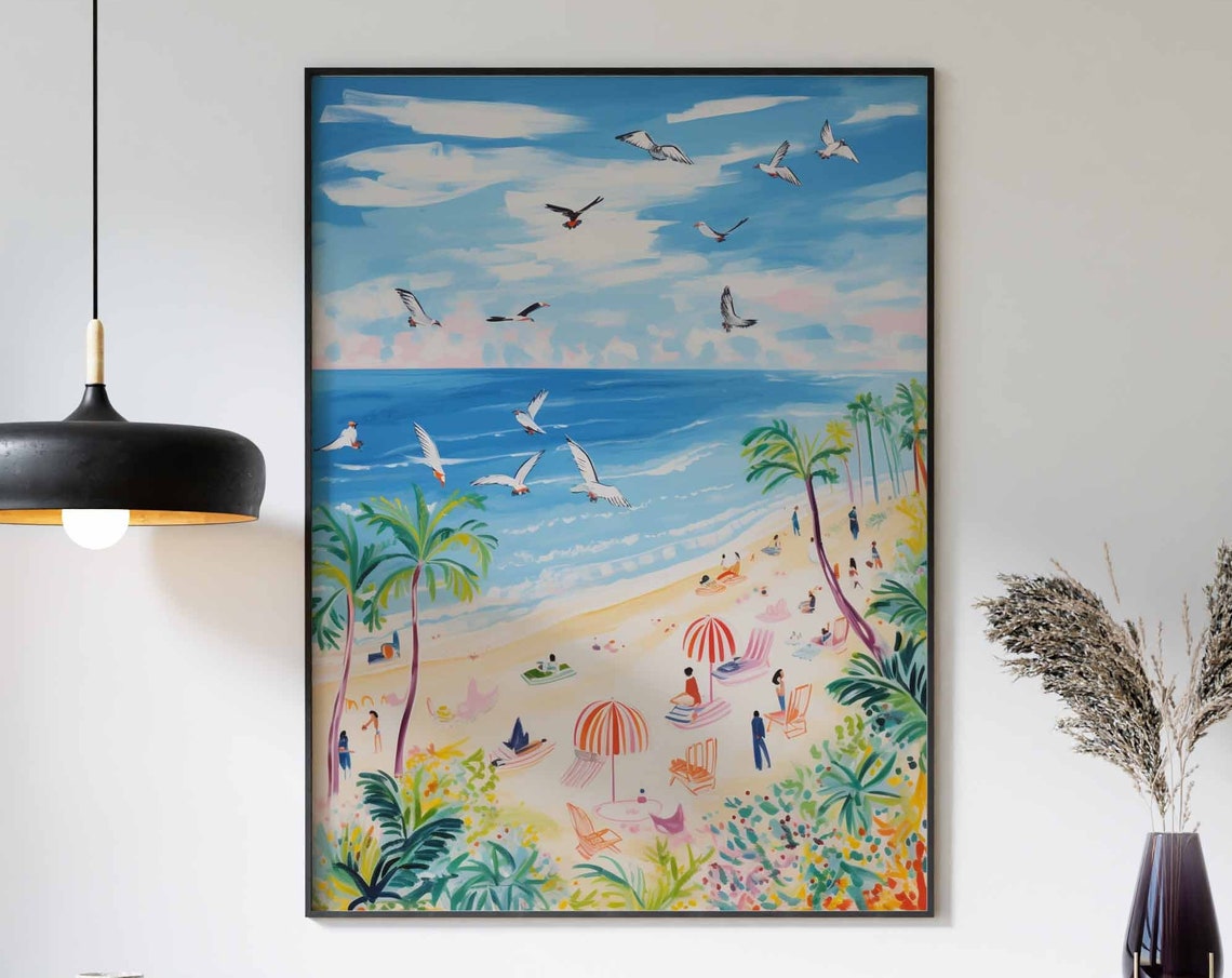 Seagulls Flying Over a Sandy Beach with Striped Umbrellas Poster
