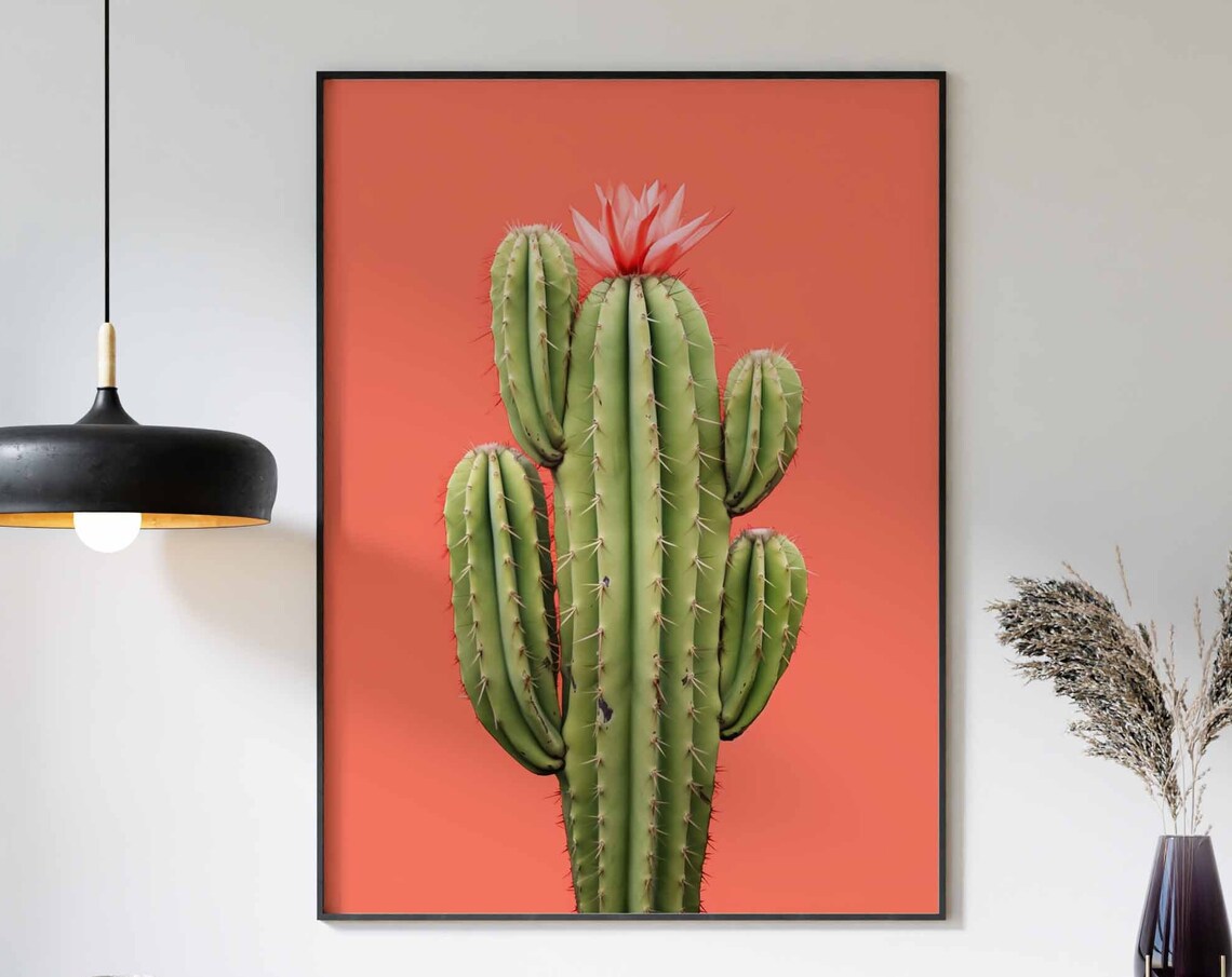 Columnar Cactus with a Single Pink Blossom on Coral Orange Poster
