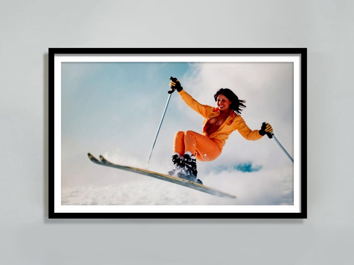 Vintage Skier Woman In Orange Jumpsuit Mid Air Jump Retro Ski Poster