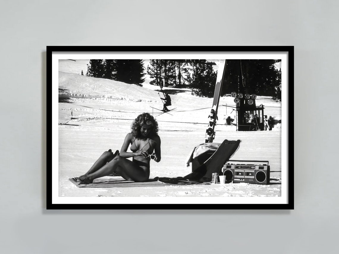 Retro Woman Sunbathing In Bikini On Snow Boombox Ski Resort Poster