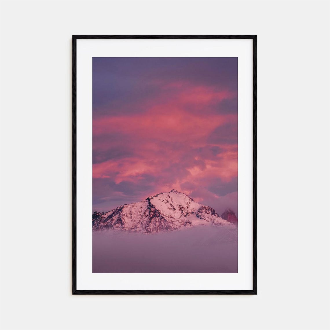 Big Sky Snow Peak Rising Above Clouds in a Pink Sunset Poster