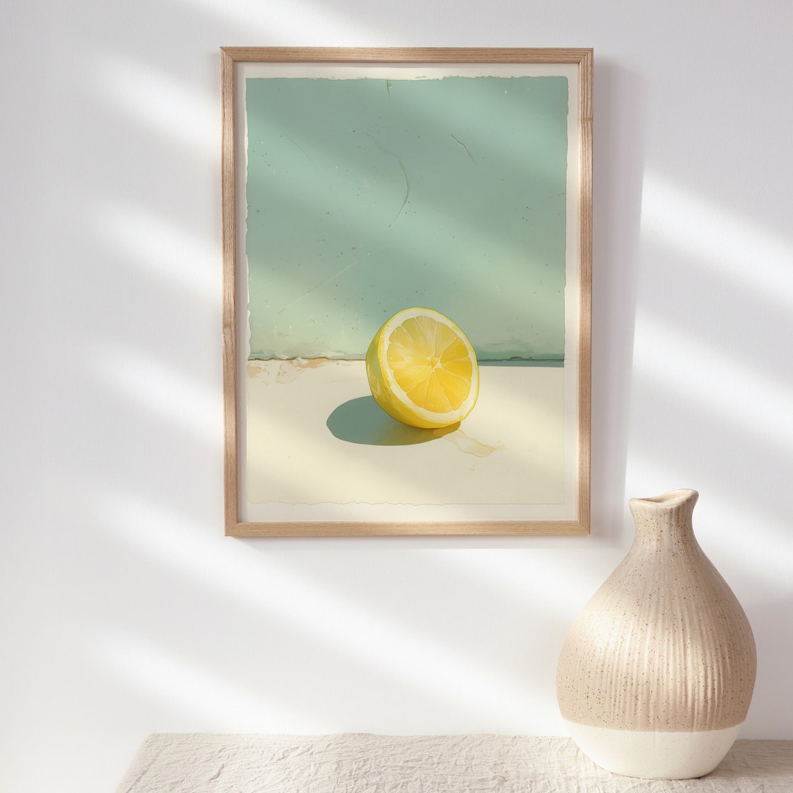 Serene Minimalist Half Lemon Resting on Warm Beach Sand Poster - Image 2