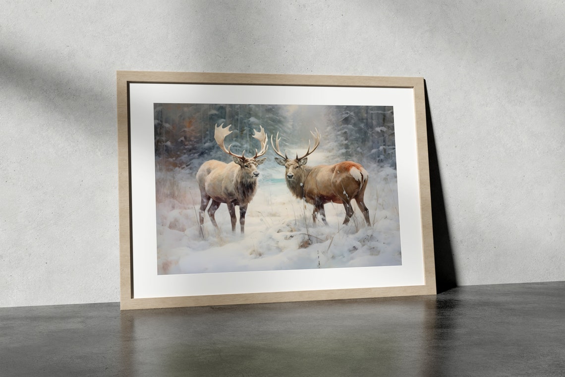 Two Majestic Stags Standing in Snow with Winter Forest Behind Poster - Image 2