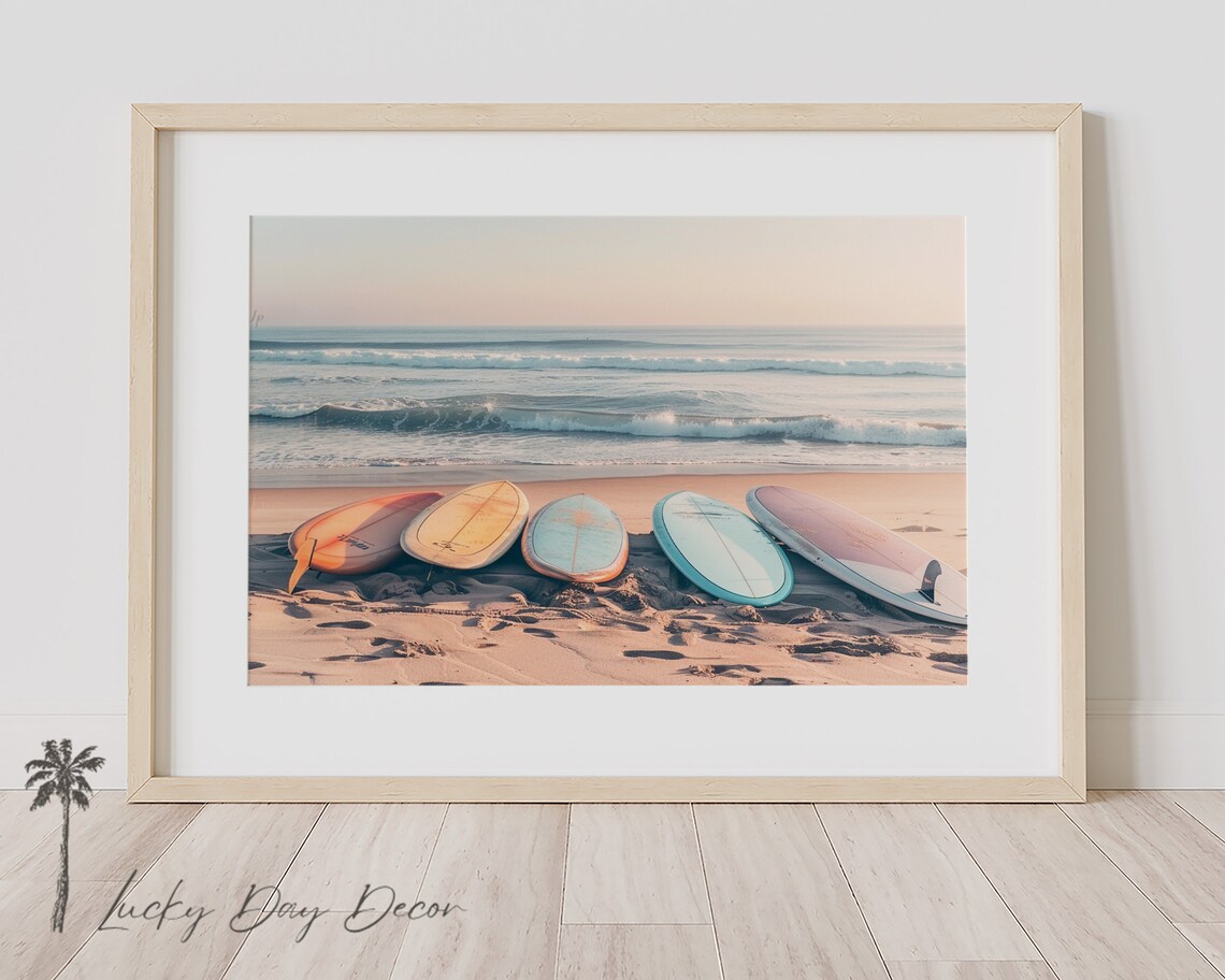 Pastel Surfboards Lined Up On Sandy Beach Shore Ocean Waves View Poster