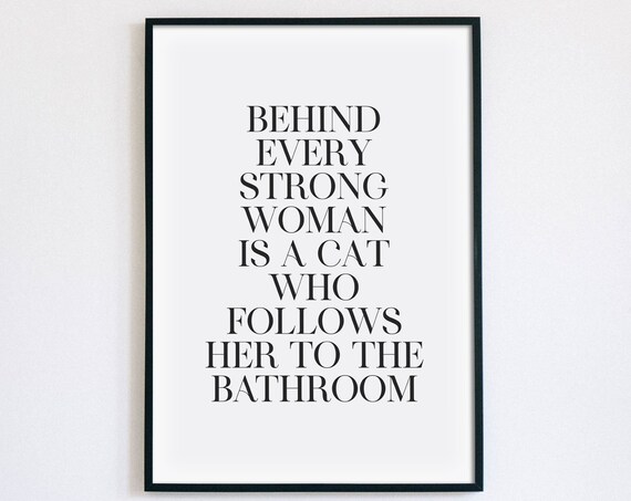 Behind Every Strong Woman Is A Cat Who Follows Her To The Bathroom Poster