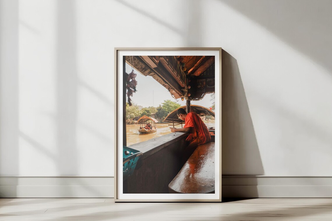 Buddhist Monk In Orange Robes On Wooden River Boat Photo Poster