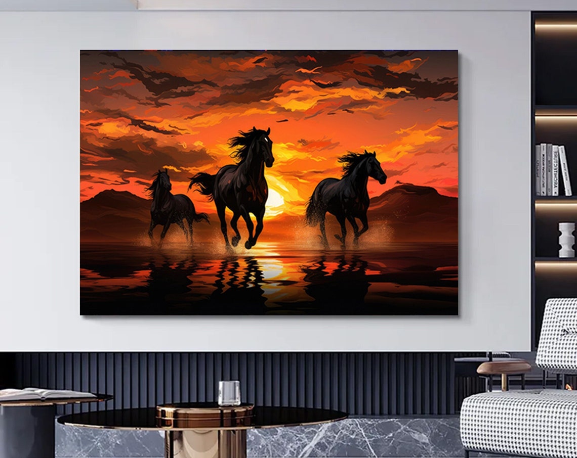 Three Black Horses Running at Sunset with Water Reflection Poster