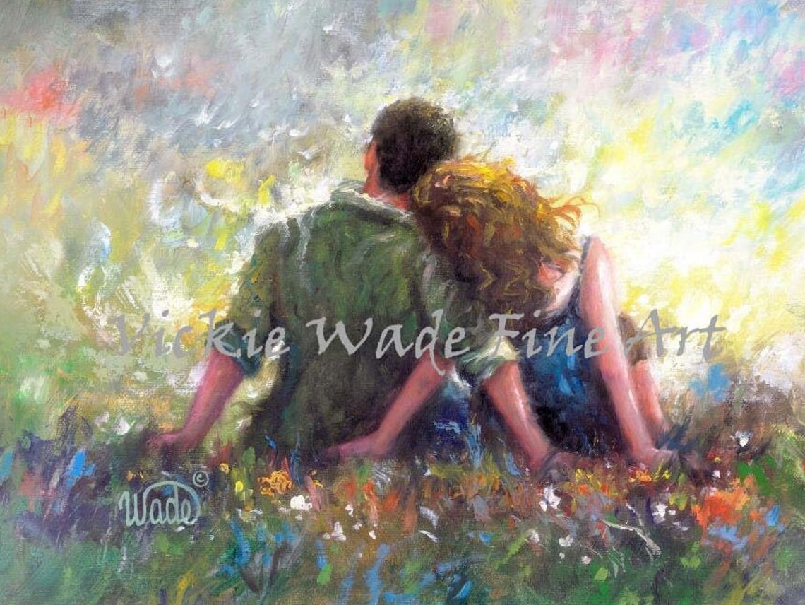 Romantic Couple Sitting Close Together In A Wildflower Meadow Poster