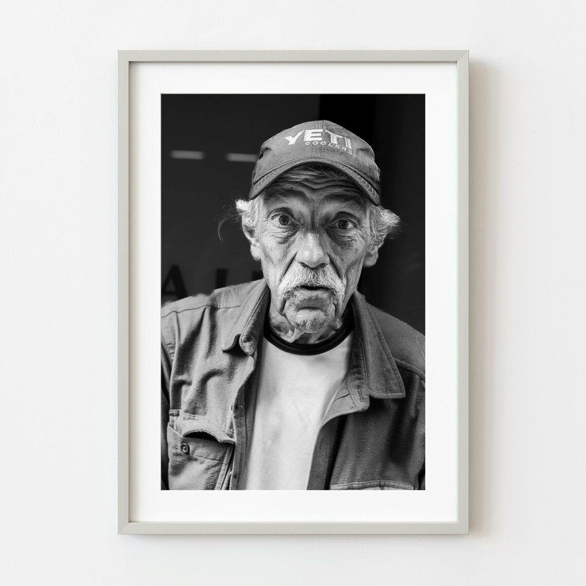 Black and White Street Portrait of an Older Man in a Cap Poster