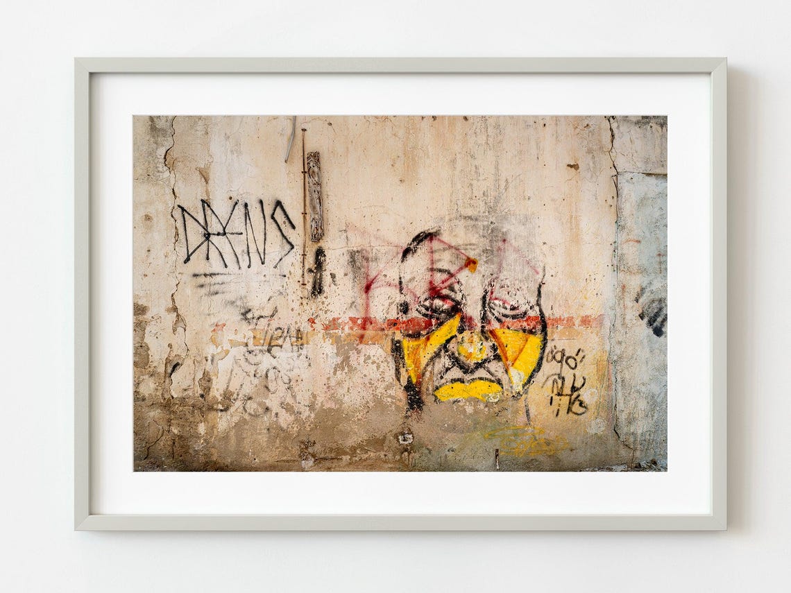 Aged Graffiti Portrait On A Decayed Wall In Willemstad Curacao Art
