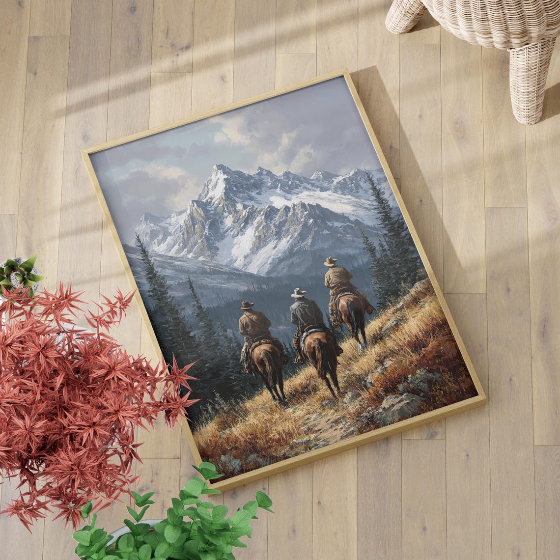 Three Cowboys Riding Horses Toward Snowy Mountain Peaks Poster